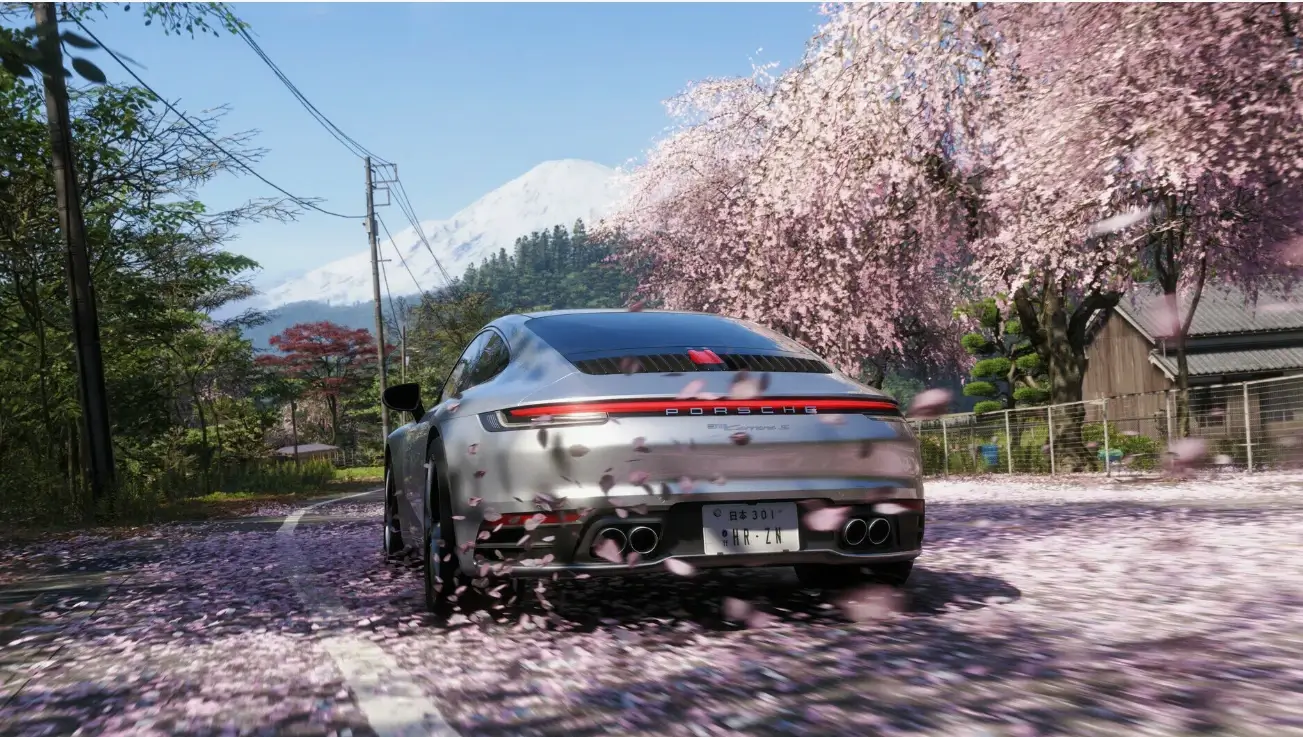 Forza Horizon 6 Gameplay Revealed: First Look at Japan Map and Features 5 Forza Horizon 6 gameplay Porsche driving on Japanese road with cherry blossoms and Mount Fuji